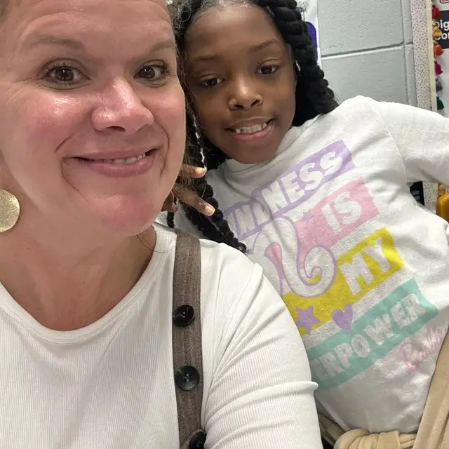 Amanda with one of her students at The Scholar Studio