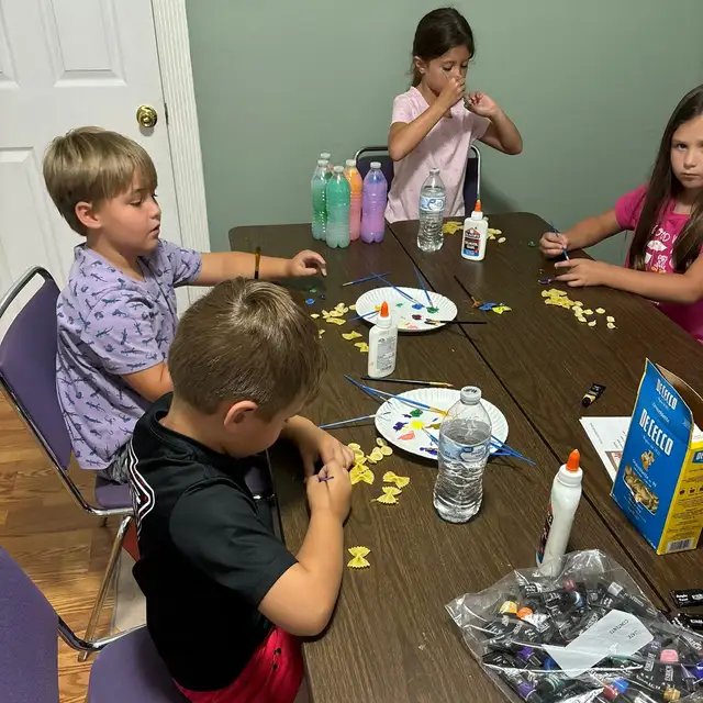 Students working on an arts and crafts project together